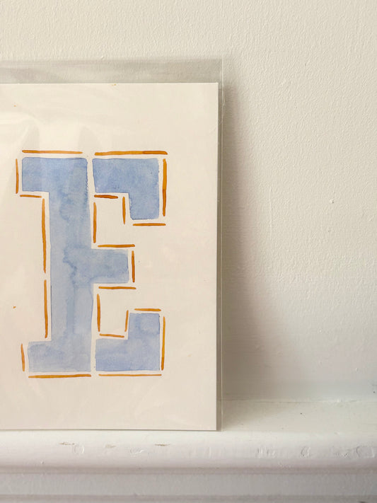 "E" Orange & Blue Watercolor on Cotton Paper by Painted by Marissa